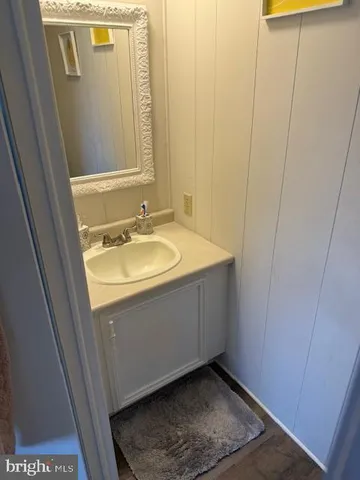 a bathroom with a toilet and a sink