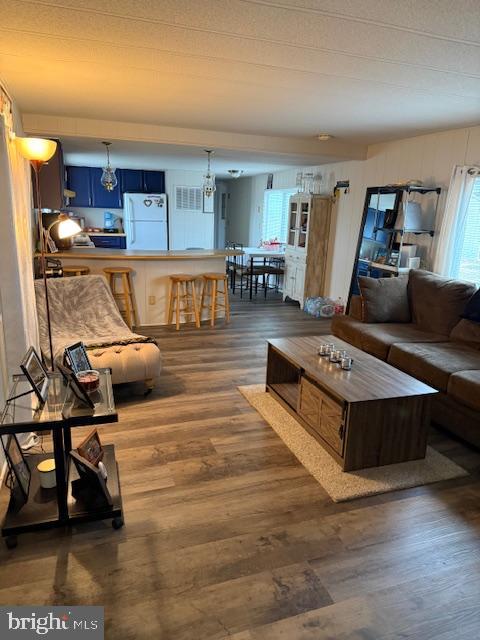 13952 Poplar Grove Road Hagerstown, MD 21742 - Photo 16 of 17 a living room with furniture and a wooden floor