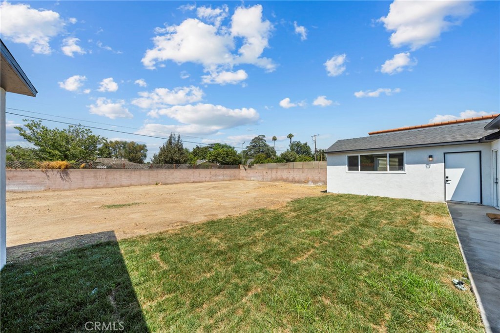 4881 Arlington Avenue Riverside, CA 92504 - Photo 37 of 37 a view of a house with a yard