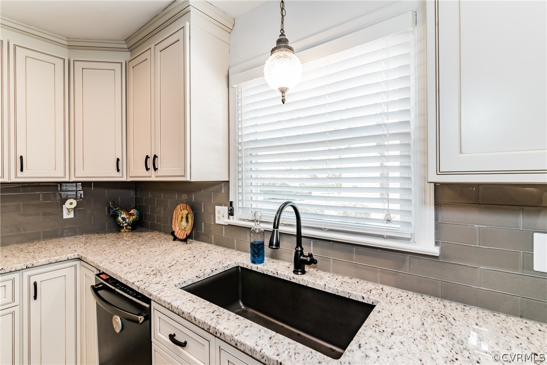 4401 Dunraven Road Chesterfield, VA 23236 - Photo 13 of 35 a kitchen with a sink and cabinets