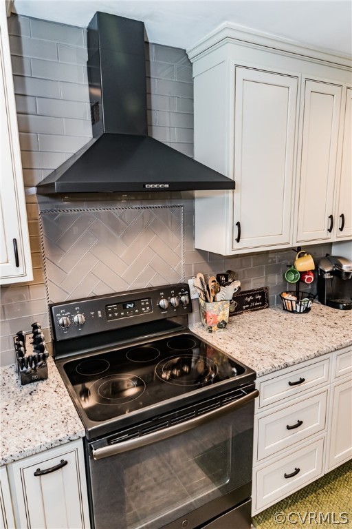 4401 Dunraven Road Chesterfield, VA 23236 - Photo 14 of 35 a kitchen with a stove and a cabinets