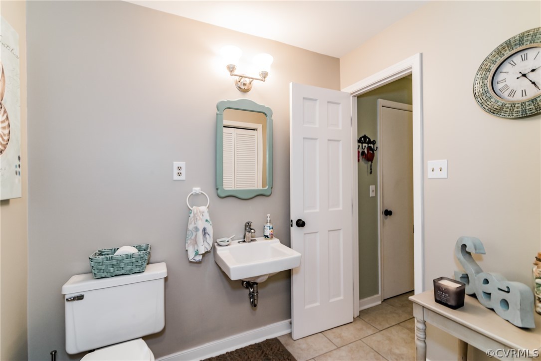 4401 Dunraven Road Chesterfield, VA 23236 - Photo 20 of 35 a bathroom with a sink and a mirror