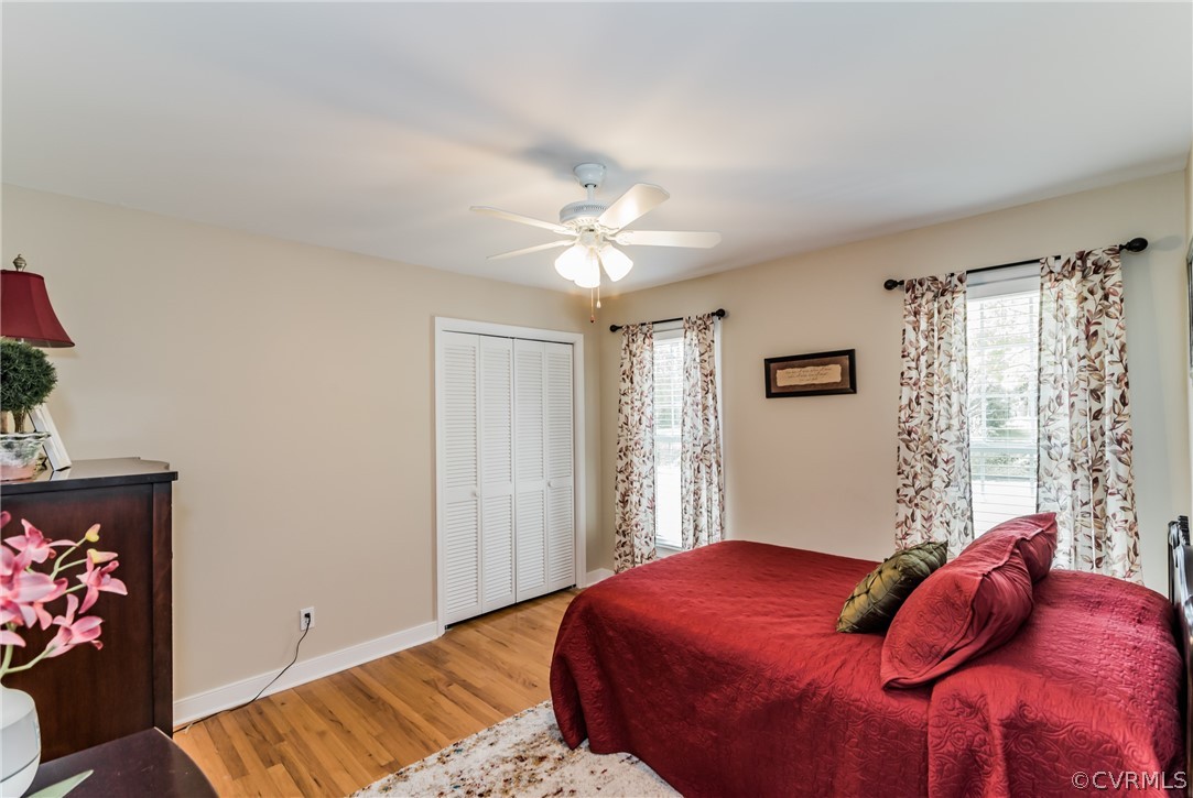 4401 Dunraven Road Chesterfield, VA 23236 - Photo 22 of 35 a bedroom with a bed and a window