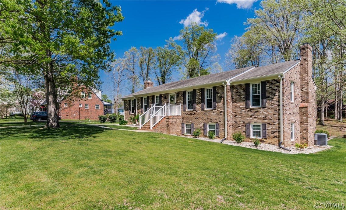 4401 Dunraven Road Chesterfield, VA 23236 - Photo 6 of 35 front view of a house with a yard