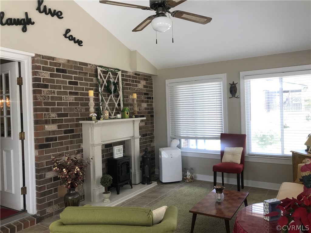 4401 Dunraven Road Chesterfield, VA 23236 - Photo 9 of 35 a living room with furniture and a fireplace