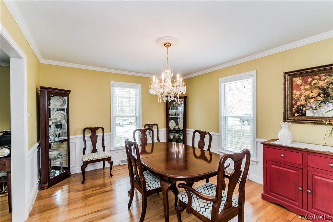 4401 Dunraven Road Chesterfield, VA 23236 - Photo 10 of 35 a view of a dining room with furniture and window
