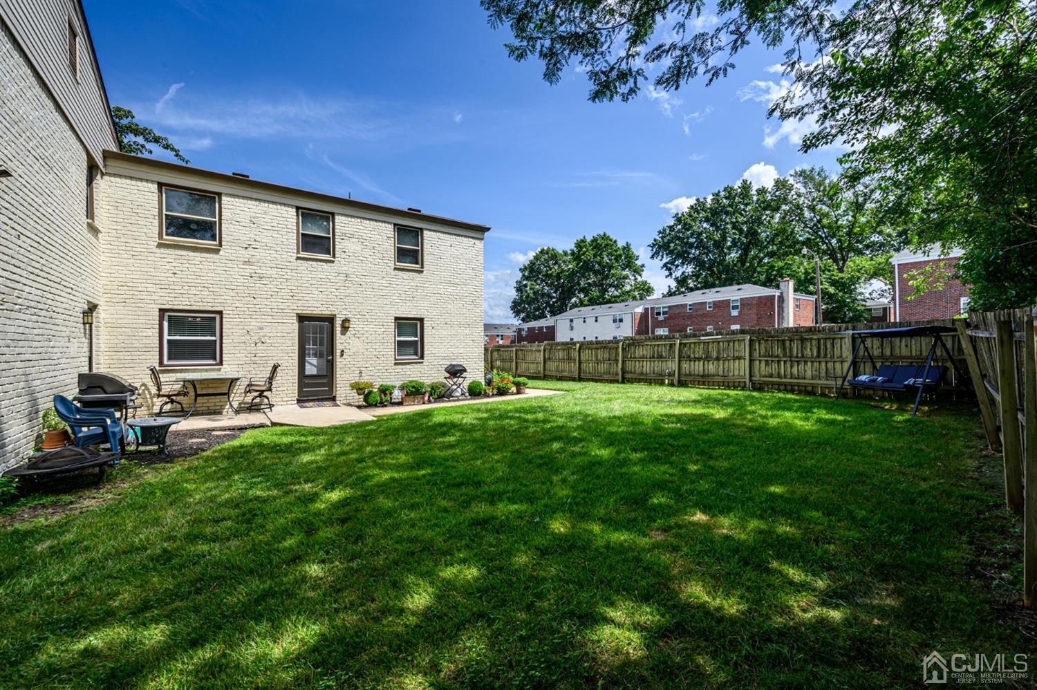 420 Cross Road, Unit B3 Matawan, NJ 07747 - Photo 22 of 24 a view of a house with backyard and sitting area