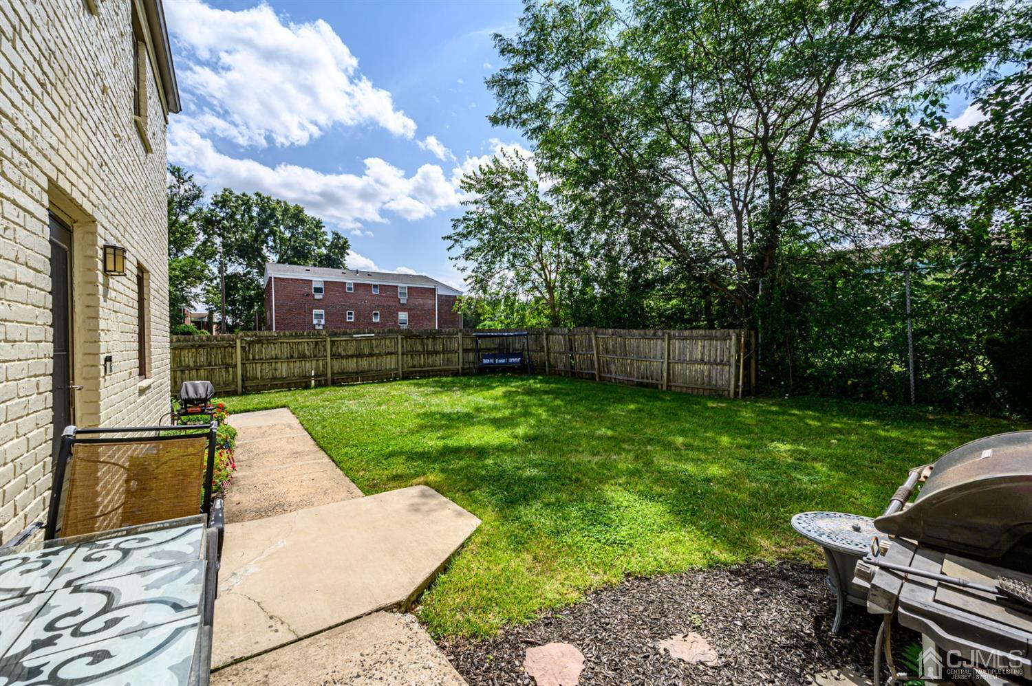 420 Cross Road, Unit B3 Matawan, NJ 07747 - Photo 23 of 24 a view of a backyard with sitting area