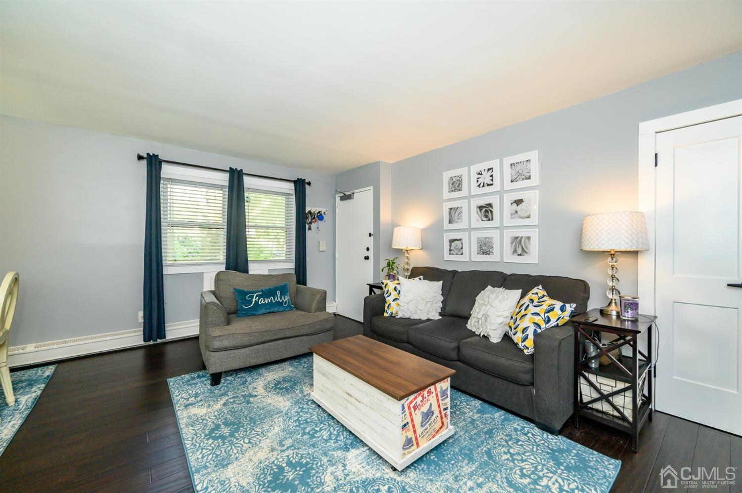 420 Cross Road, Unit B3 Matawan, NJ 07747 - Photo 7 of 24 a living room with furniture and a window