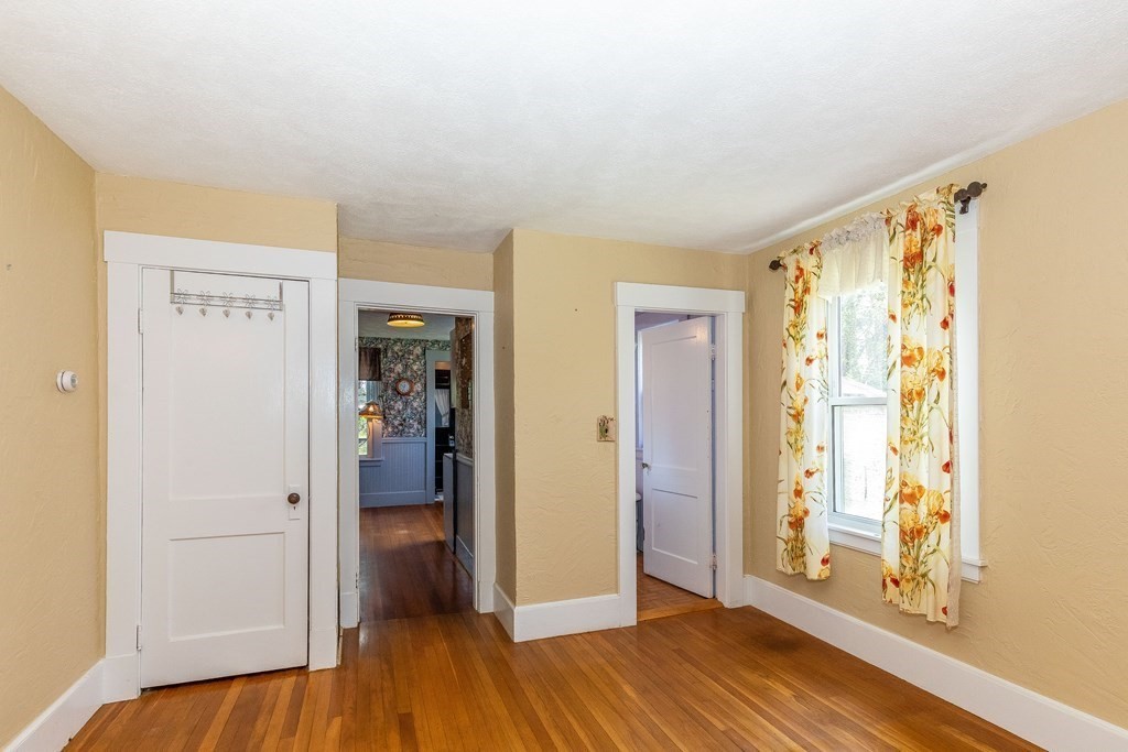 600 Springs Road Bedford, MA 01730 - Photo 21 of 38 a view of entryway with wooden floor