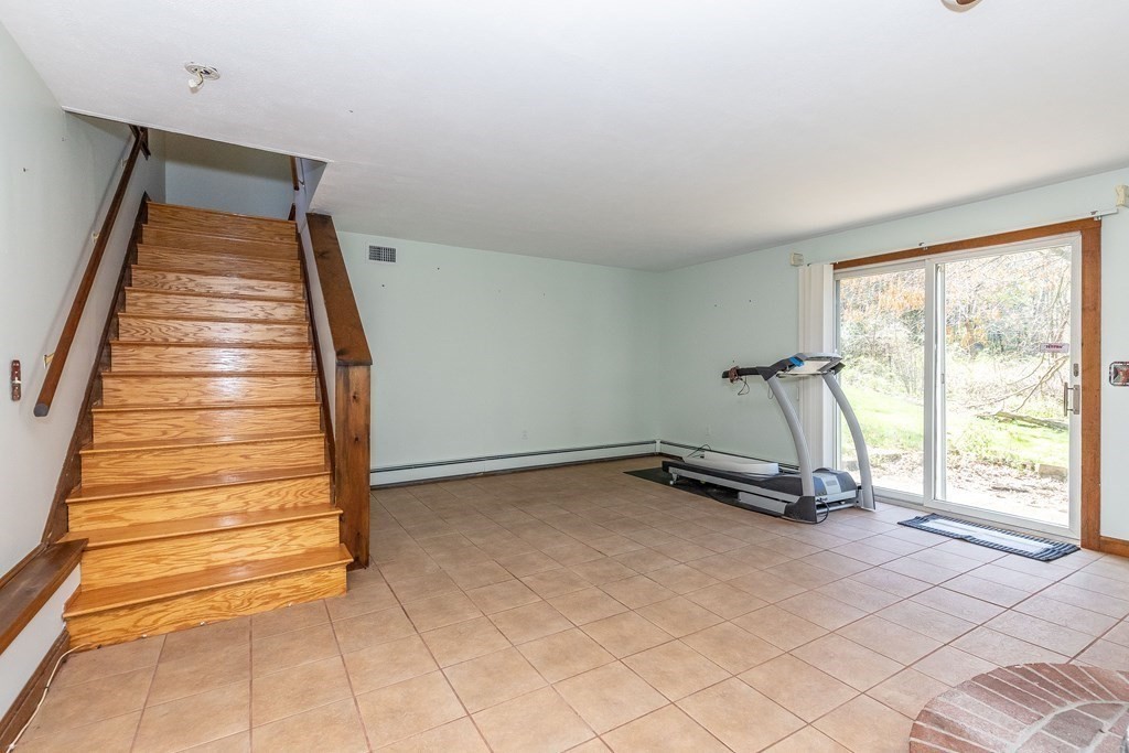 600 Springs Road Bedford, MA 01730 - Photo 32 of 38 a view of a room with gym equipment