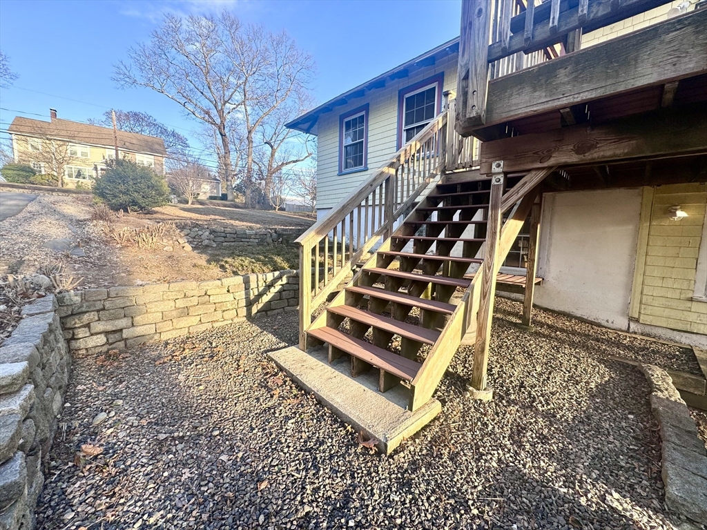 53 Circuit Road Dedham, MA 02026 - Photo 25 of 26 a view of entryway with wooden floor