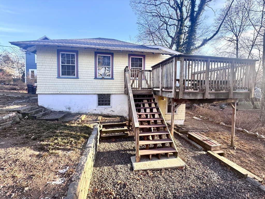 53 Circuit Road Dedham, MA 02026 - Photo 26 of 26 a front view of a house with wooden fence