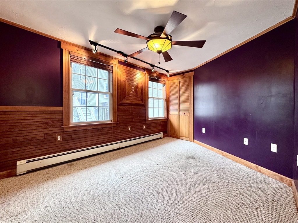 53 Circuit Road Dedham, MA 02026 - Photo 8 of 26 a view of an empty room and window
