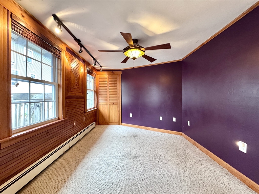 53 Circuit Road Dedham, MA 02026 - Photo 9 of 26 a view of an empty room with window
