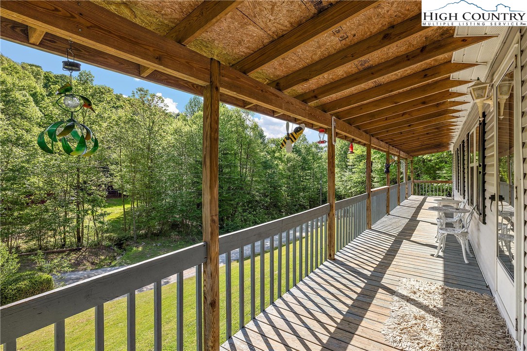 787 Lawrence Greene Road Deep Gap, NC 28618 - Photo 30 of 45 a view of balcony with wooden floor