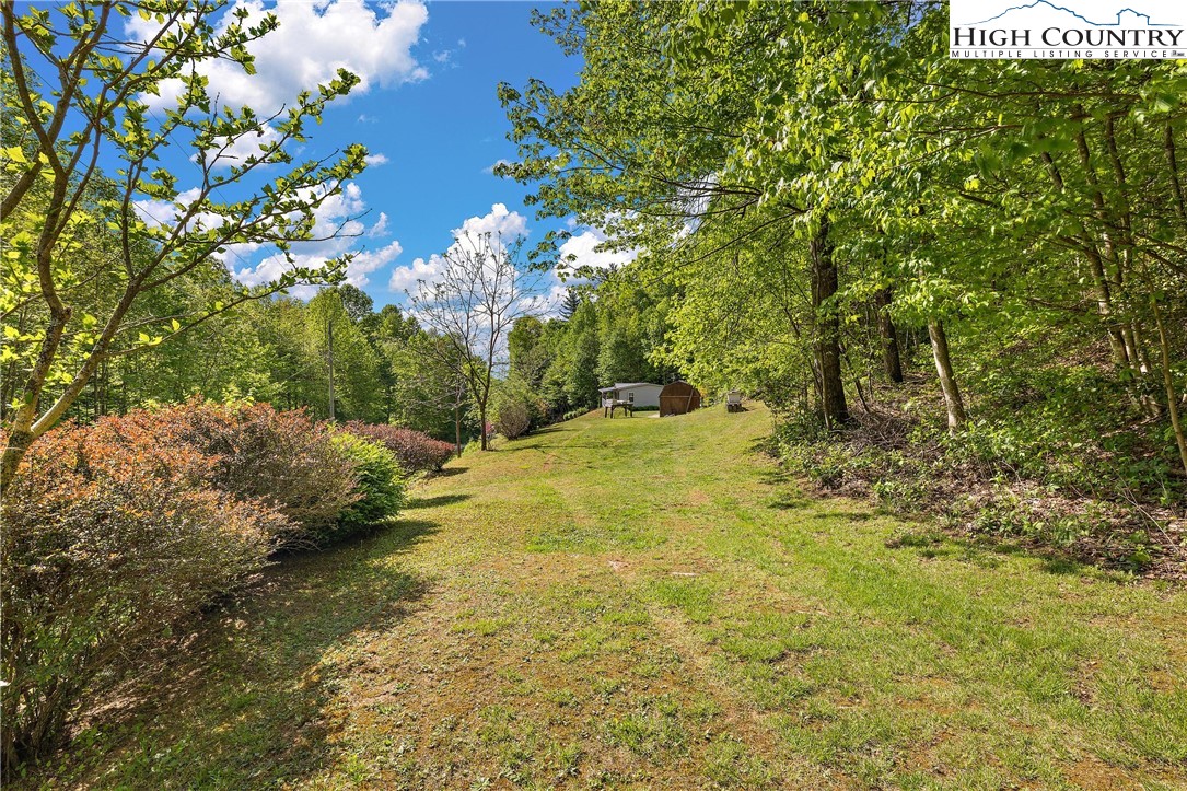 787 Lawrence Greene Road Deep Gap, NC 28618 - Photo 38 of 45 a view of outdoor space and yard