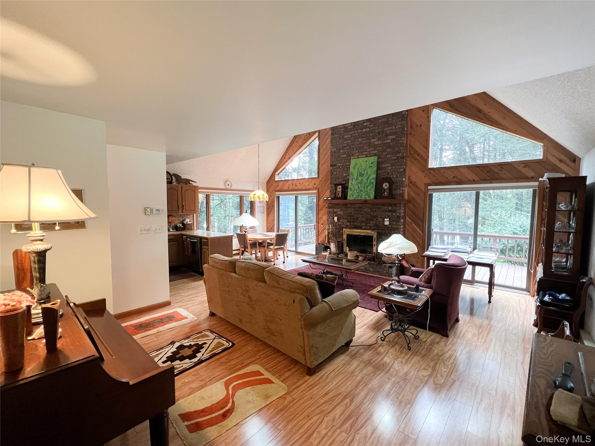 72 Black Lake Road Bethel, NY 12786 - Photo 11 of 22 a living room with furniture and a large window