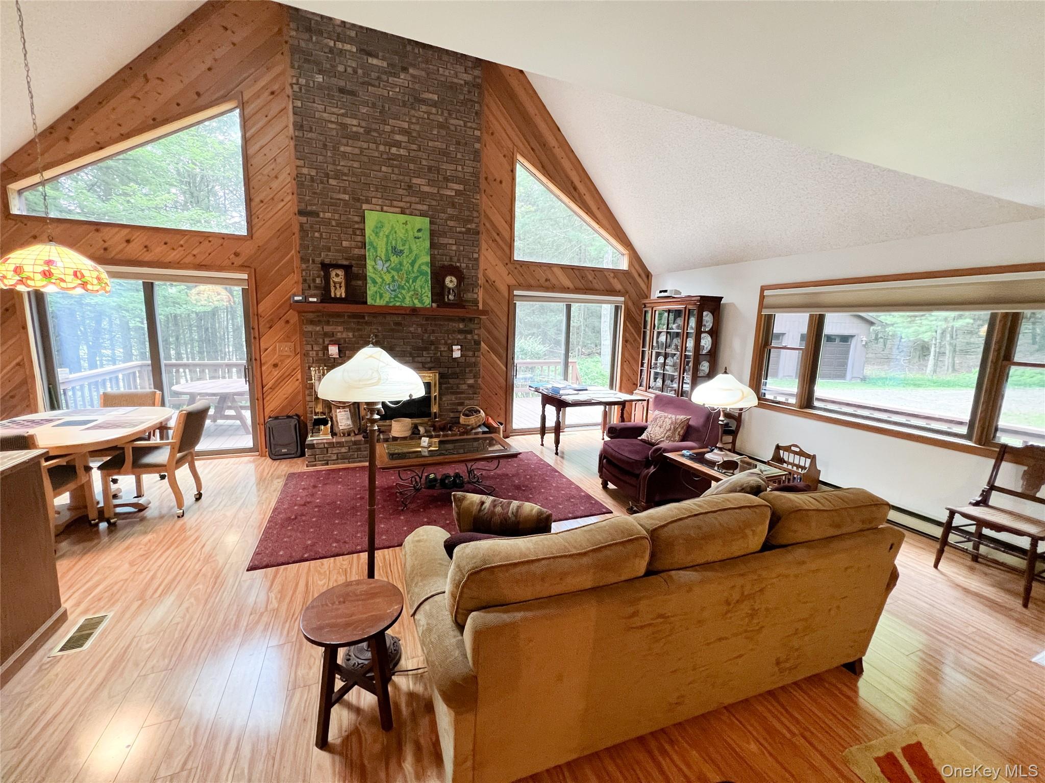 72 Black Lake Road Bethel, NY 12786 - Photo 13 of 22 a living room with furniture and a large window