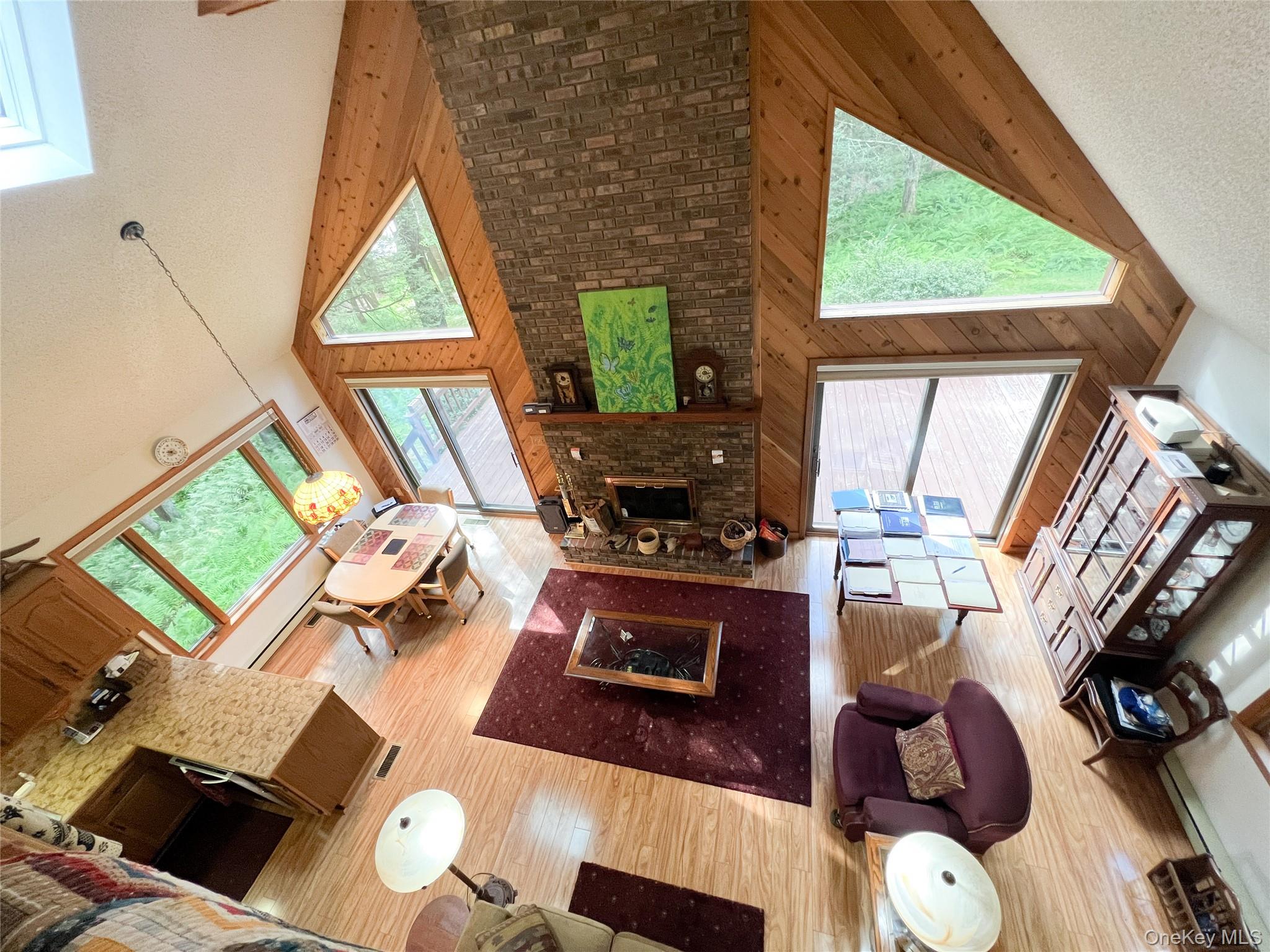 72 Black Lake Road Bethel, NY 12786 - Photo 18 of 22 a living room with furniture and a fireplace