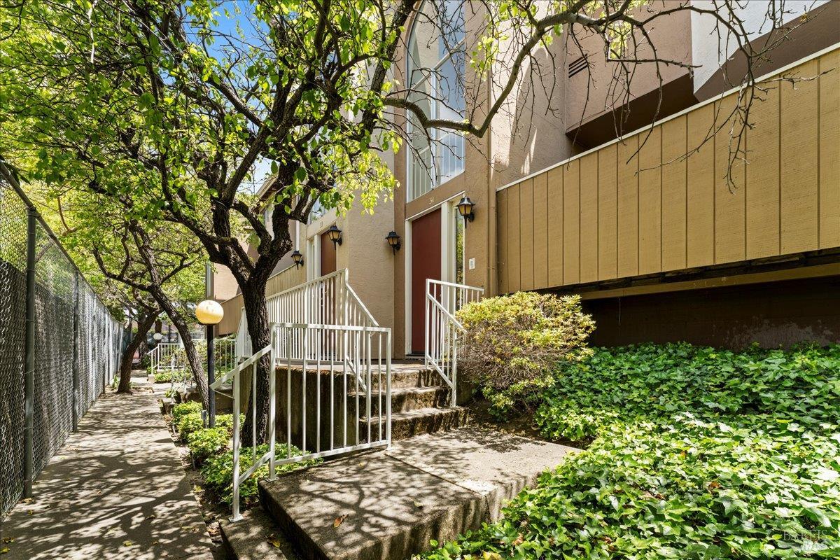 a view of a house with a flower garden