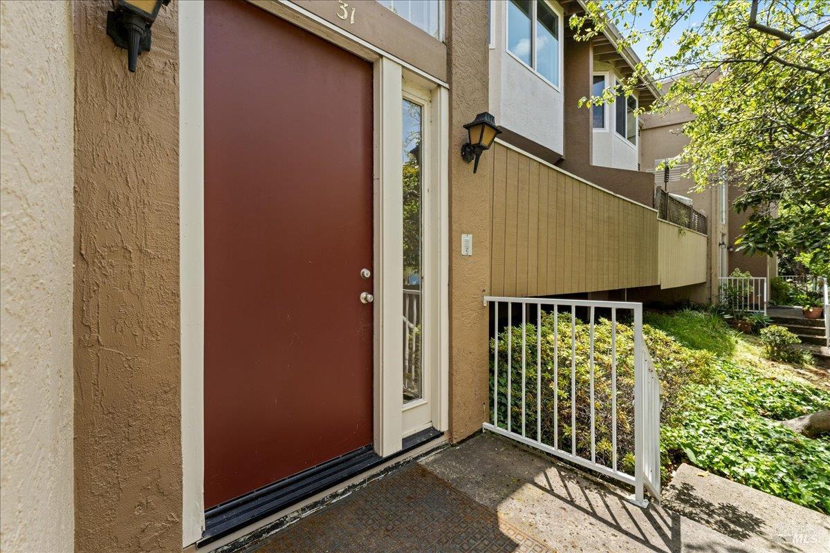 2121 Vale Road, Unit 31 San Pablo, CA 94806 - Photo 2 of 36 a balcony with next to a yard