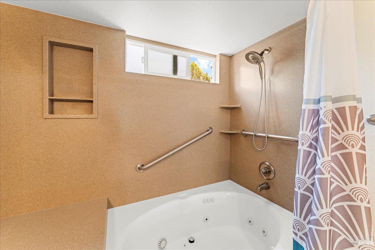 2121 Vale Road, Unit 31 San Pablo, CA 94806 - Photo 24 of 36 a bathroom with a bathtub and a shower