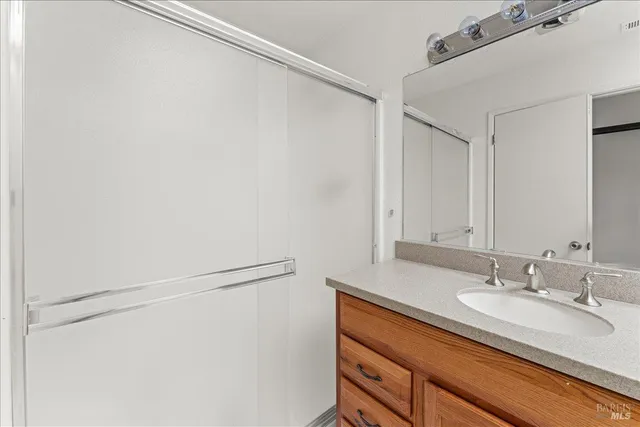 a view of outdoor space with wooden floor and windows