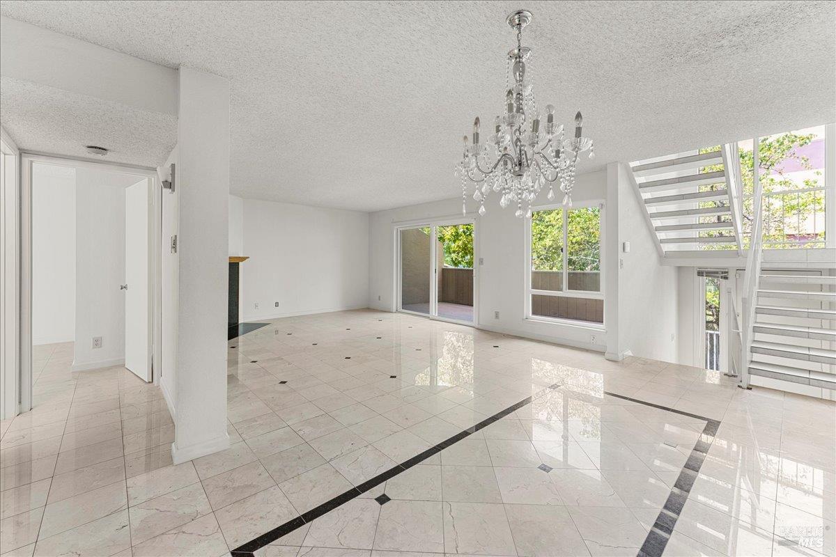 2121 Vale Road, Unit 31 San Pablo, CA 94806 - Photo 8 of 36 a large white kitchen with a large window