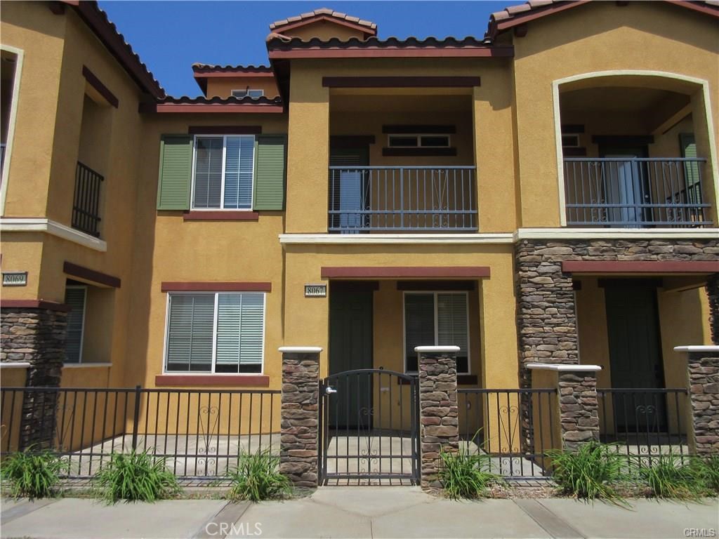 8067 Cresta Bella Road Rancho Cucamonga, CA 91730 - Photo 1 of 1 a front view of a house with a yard