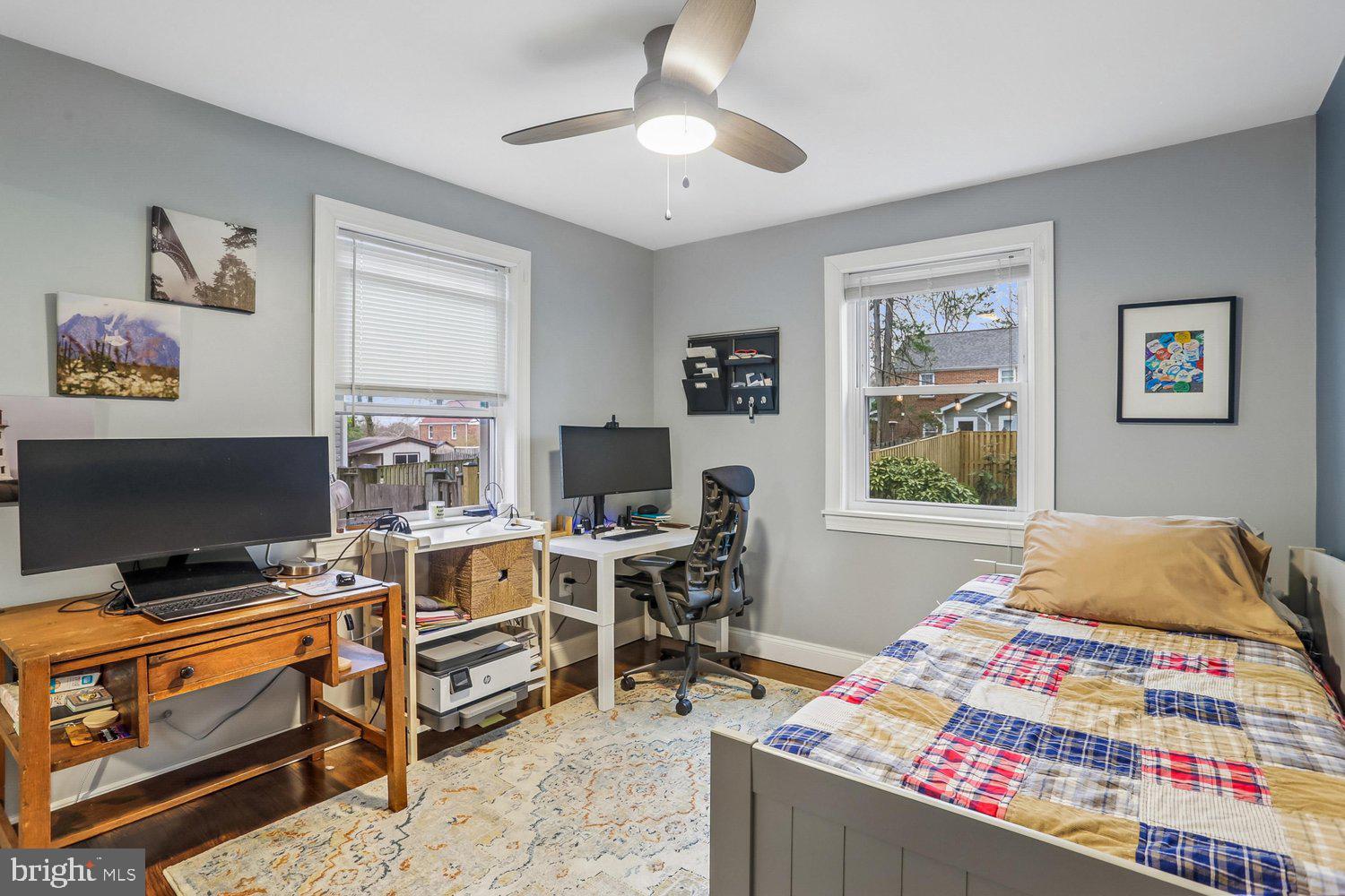 1611 Noyes Drive Silver Spring, MD 20910 - Photo 21 of 47 a bedroom with a bed and a desk