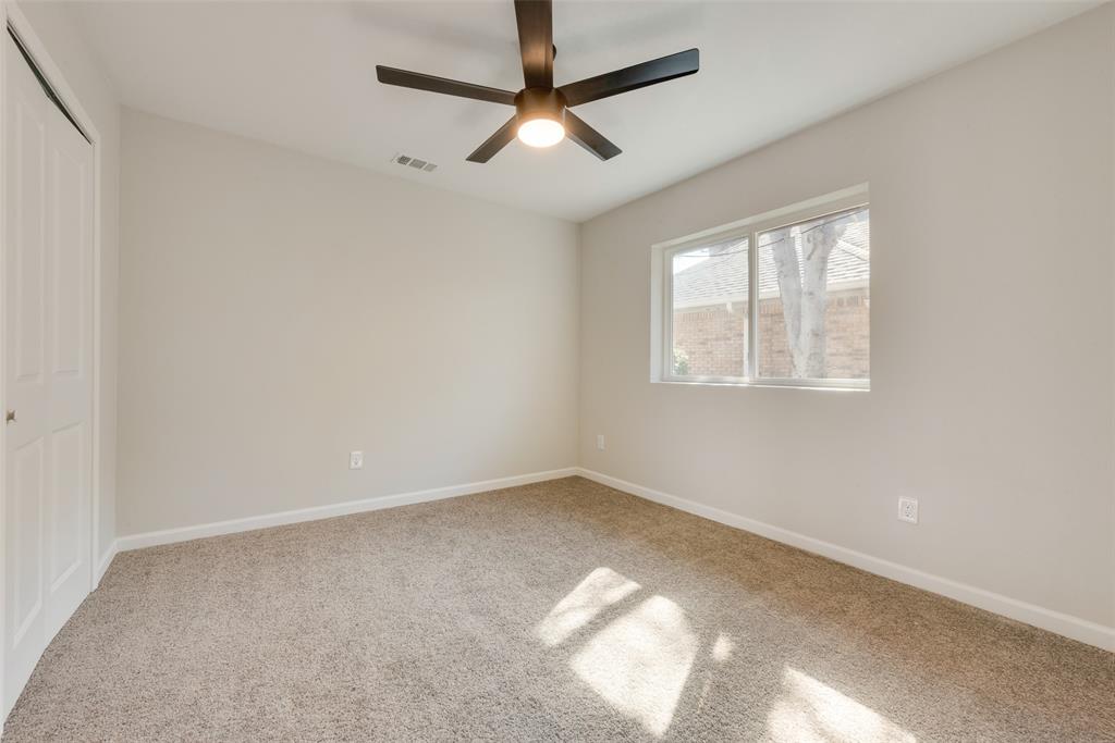 1614 Caddys Circle Garland, TX 75043 - Photo 10 of 13 a view of an empty room with a window