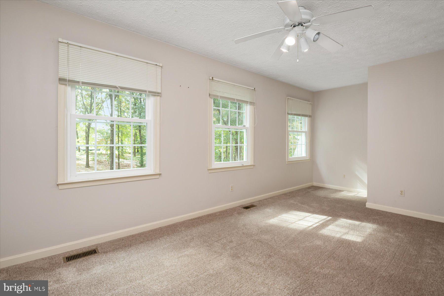 7907 Poplar Grove Road Severn, MD 21144 - Photo 22 of 38 a view of an empty room with a window