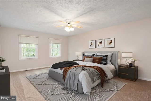 a bedroom with bed and a window