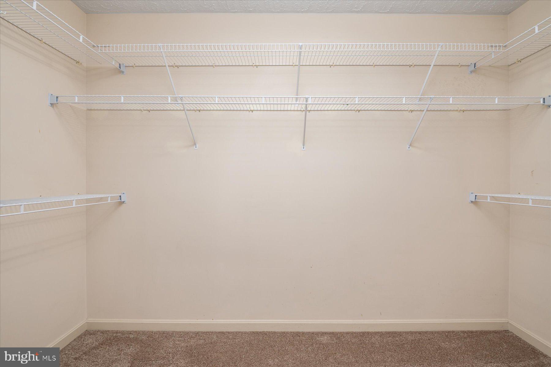 7907 Poplar Grove Road Severn, MD 21144 - Photo 27 of 38 a view of a room with racks on the wall