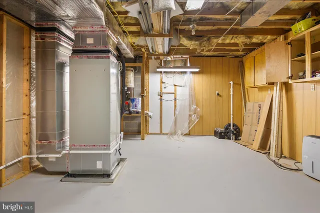 a view of a room with wooden walls