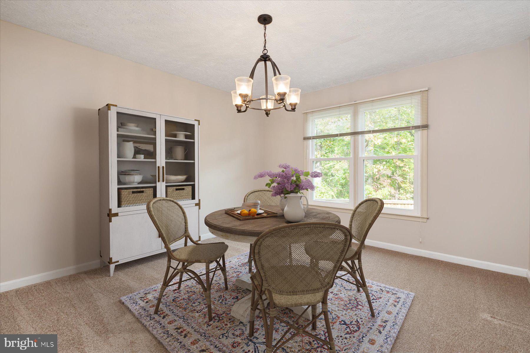 7907 Poplar Grove Road Severn, MD 21144 - Photo 8 of 38 a dining room with furniture window wooden floor