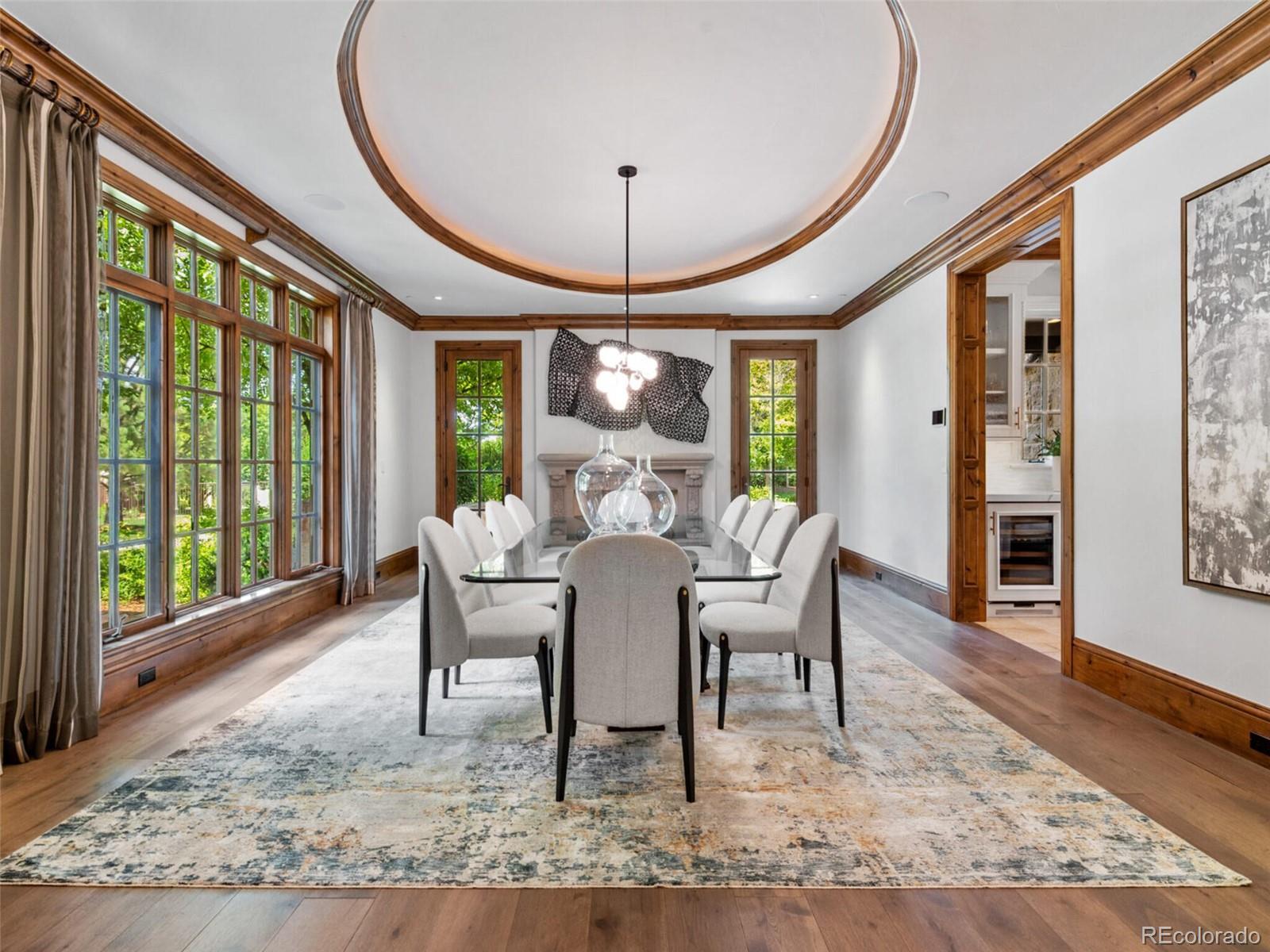 4 Haystack Row Cherry Hills Village, CO 80113 - Photo 14 of 31 a view of a dining room with furniture window and wooden floor