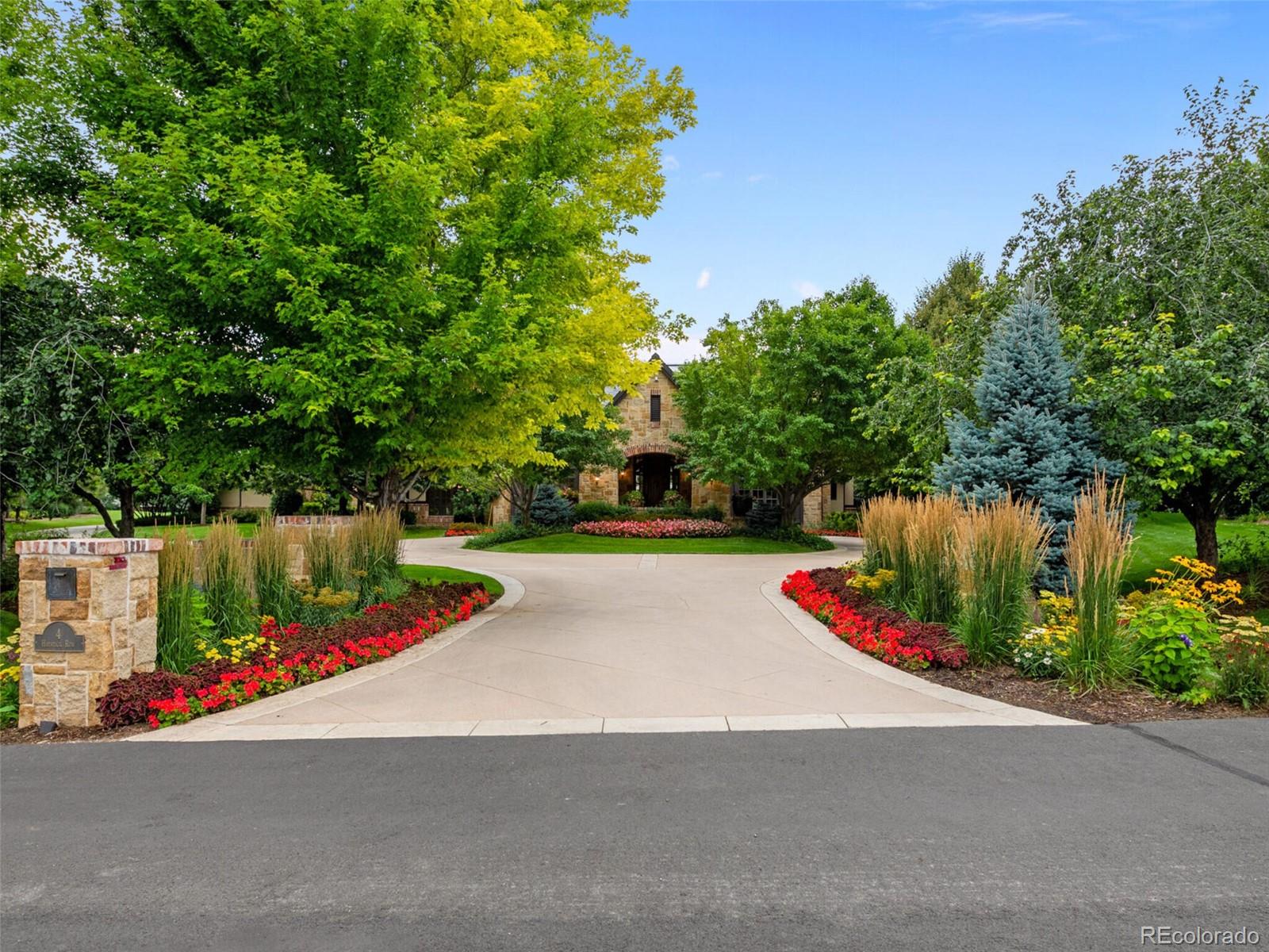 4 Haystack Row Cherry Hills Village, CO 80113 - Photo 2 of 31 a garden view with a street view