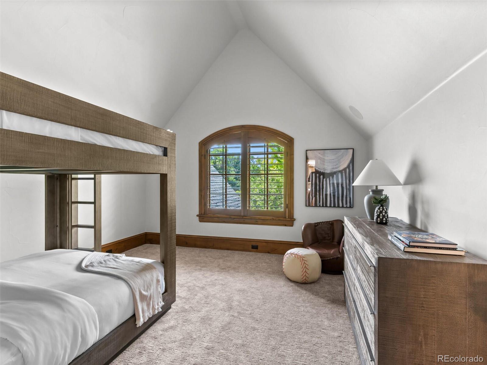 4 Haystack Row Cherry Hills Village, CO 80113 - Photo 23 of 31 a bedroom with a bed and a window