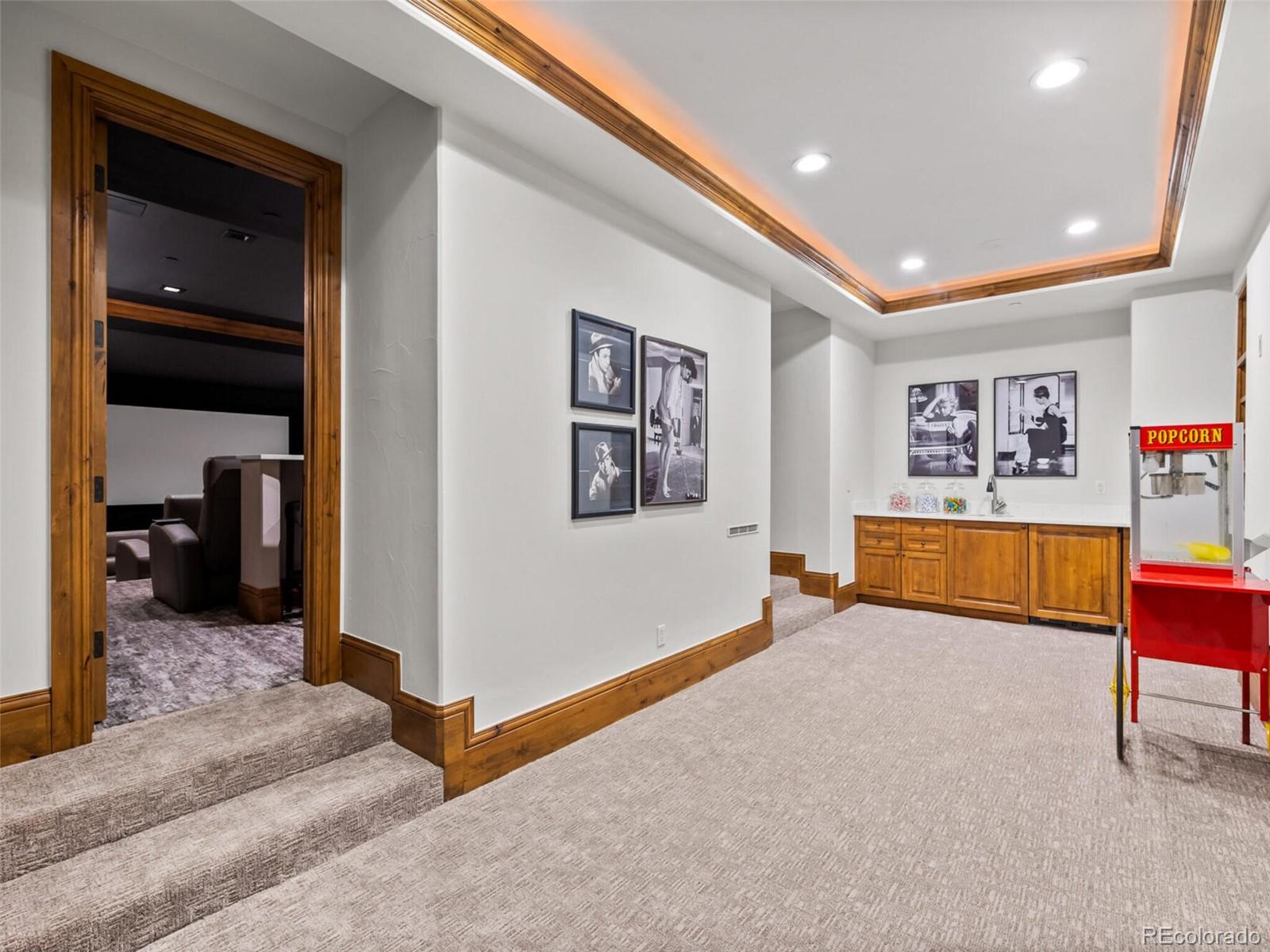 4 Haystack Row Cherry Hills Village, CO 80113 - Photo 30 of 31 a view of a hallway with couch and dresser