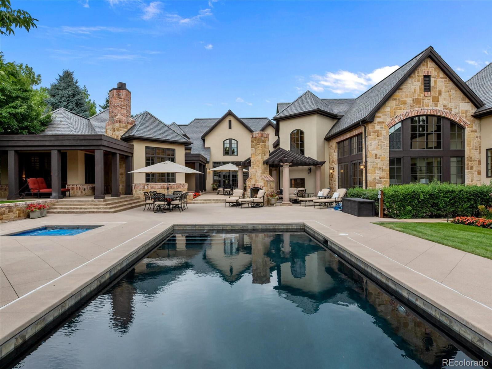 4 Haystack Row Cherry Hills Village, CO 80113 - Photo 6 of 31 a swimming pool view with a outdoor seating space