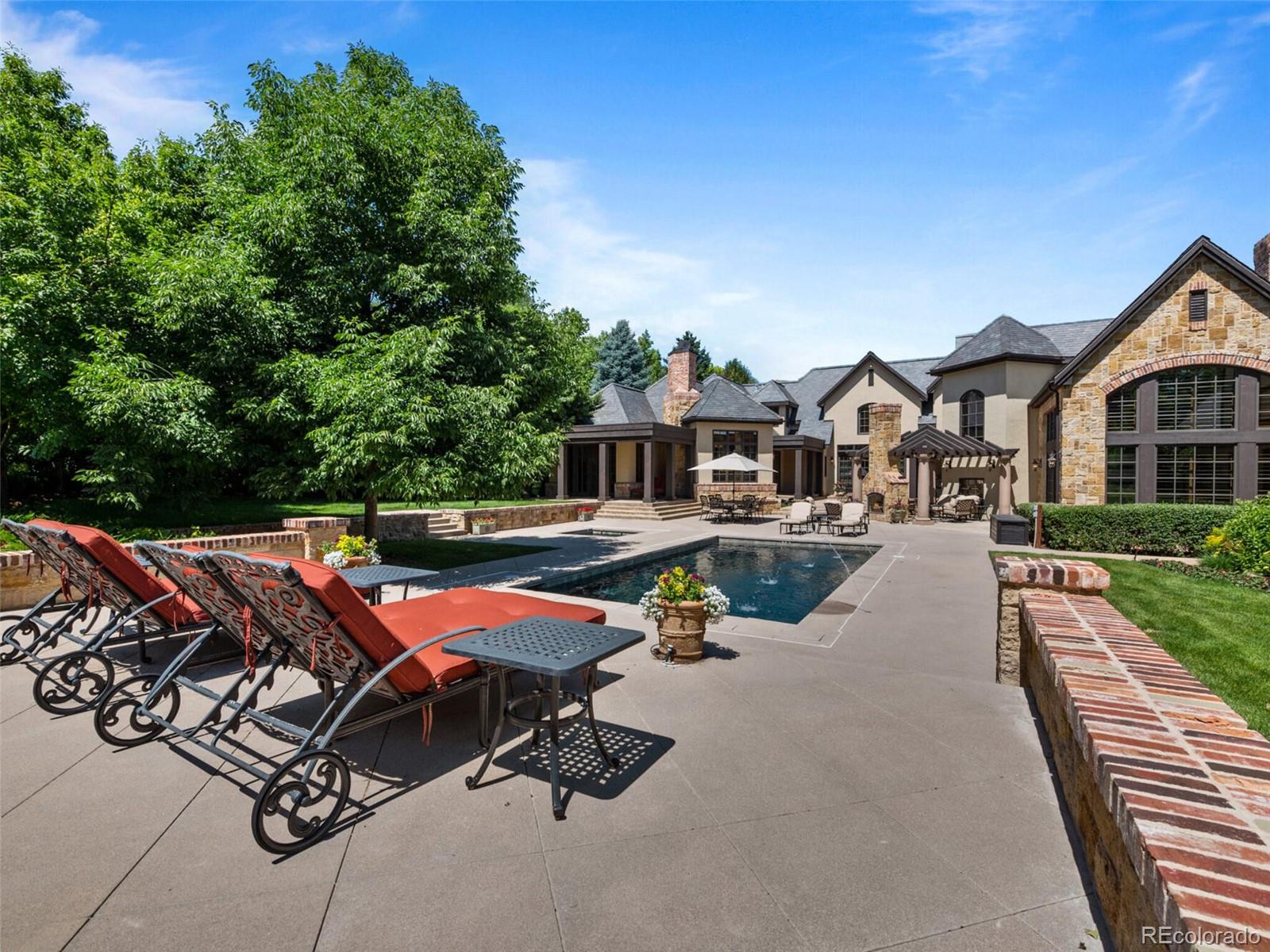 4 Haystack Row Cherry Hills Village, CO 80113 - Photo 7 of 31 a view of a patio with a table and chairs