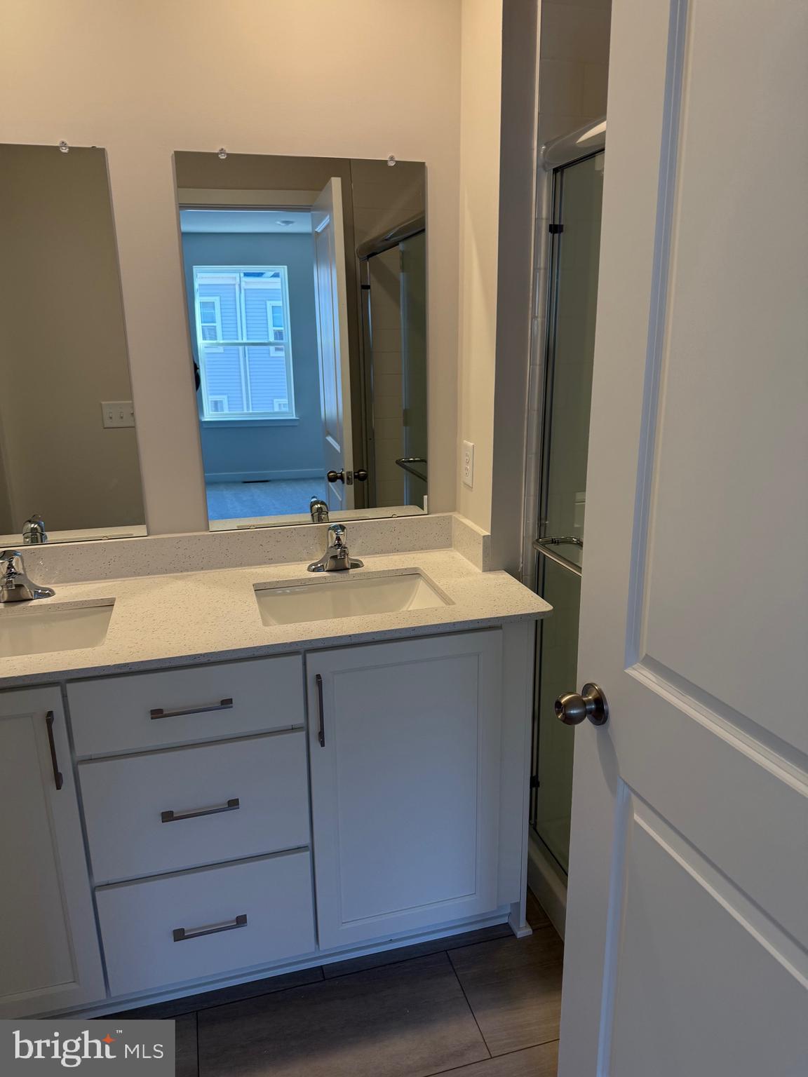 9 Barbine Way Bridgeport, PA 19405 - Photo 10 of 12 a bathroom with a sink and a mirror