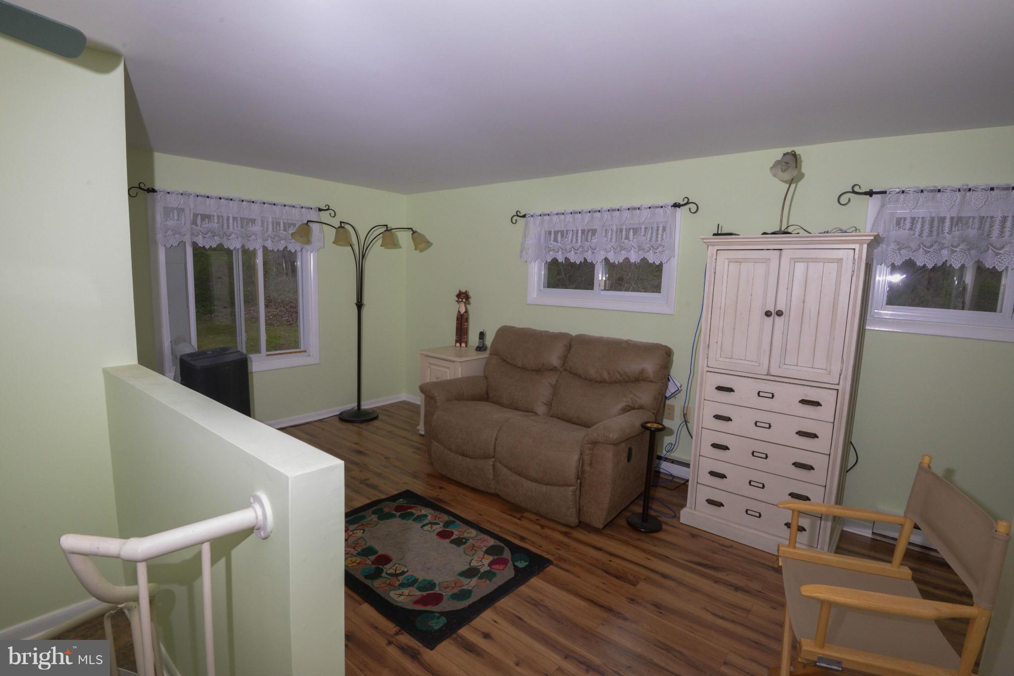 21207 Greenbrier Road Boonsboro, MD 21713 - Photo 18 of 30 Bedroom or den on second level.