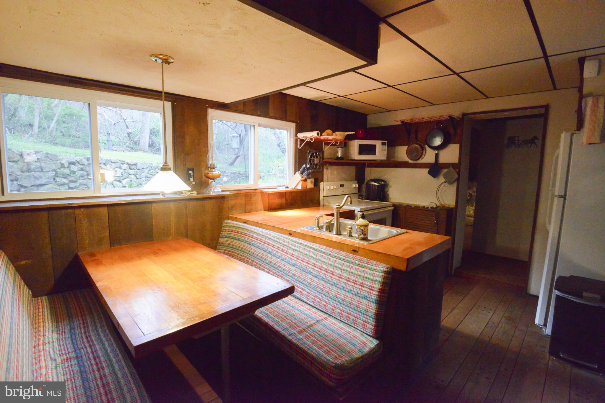 21207 Greenbrier Road Boonsboro, MD 21713 - Photo 5 of 30 Dining Room in original cabin.