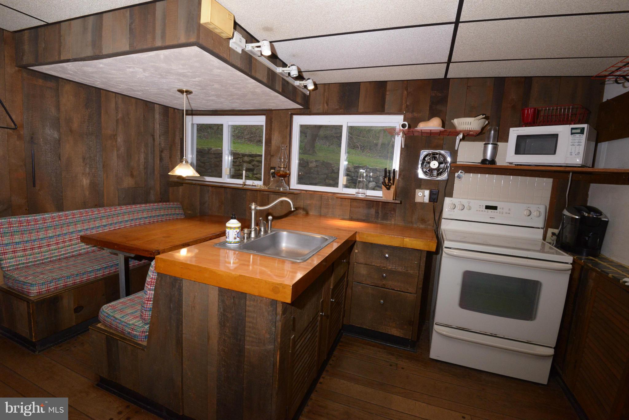 21207 Greenbrier Road Boonsboro, MD 21713 - Photo 6 of 30 Kitchen in original cabin.