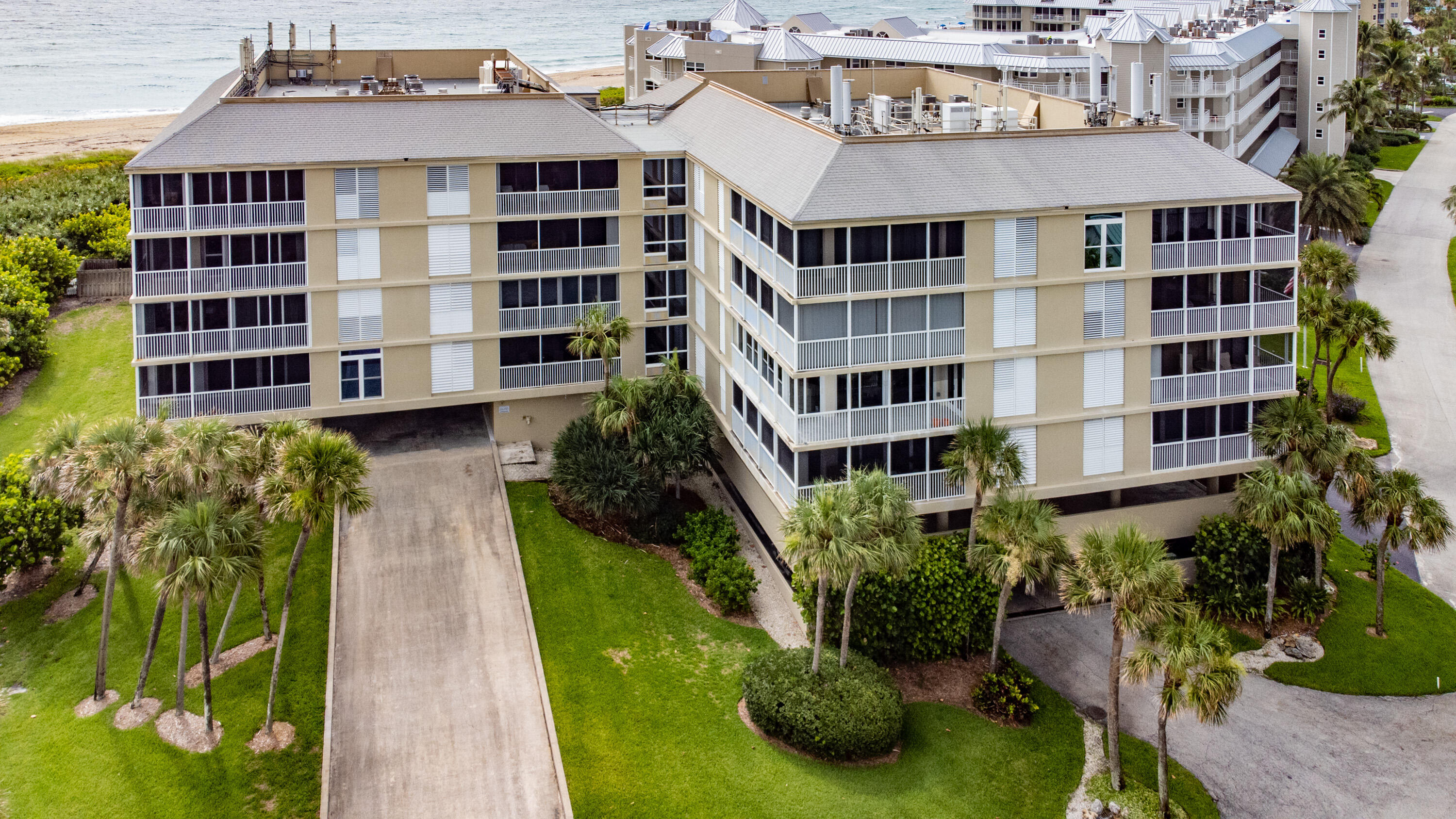 669 Northeast Plantation Road, Unit 308 Jensen Beach, FL 34957 - Photo 24 of 39 From building to pool/beach