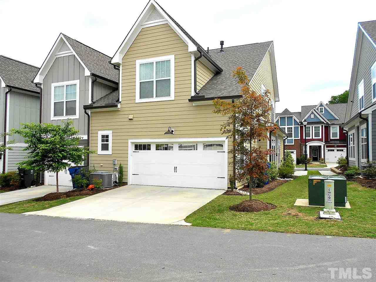 776 Fallon Grove Way Raleigh, NC 27608 - Photo 19 of 22 ...showing the 2-car garage entrance and pad