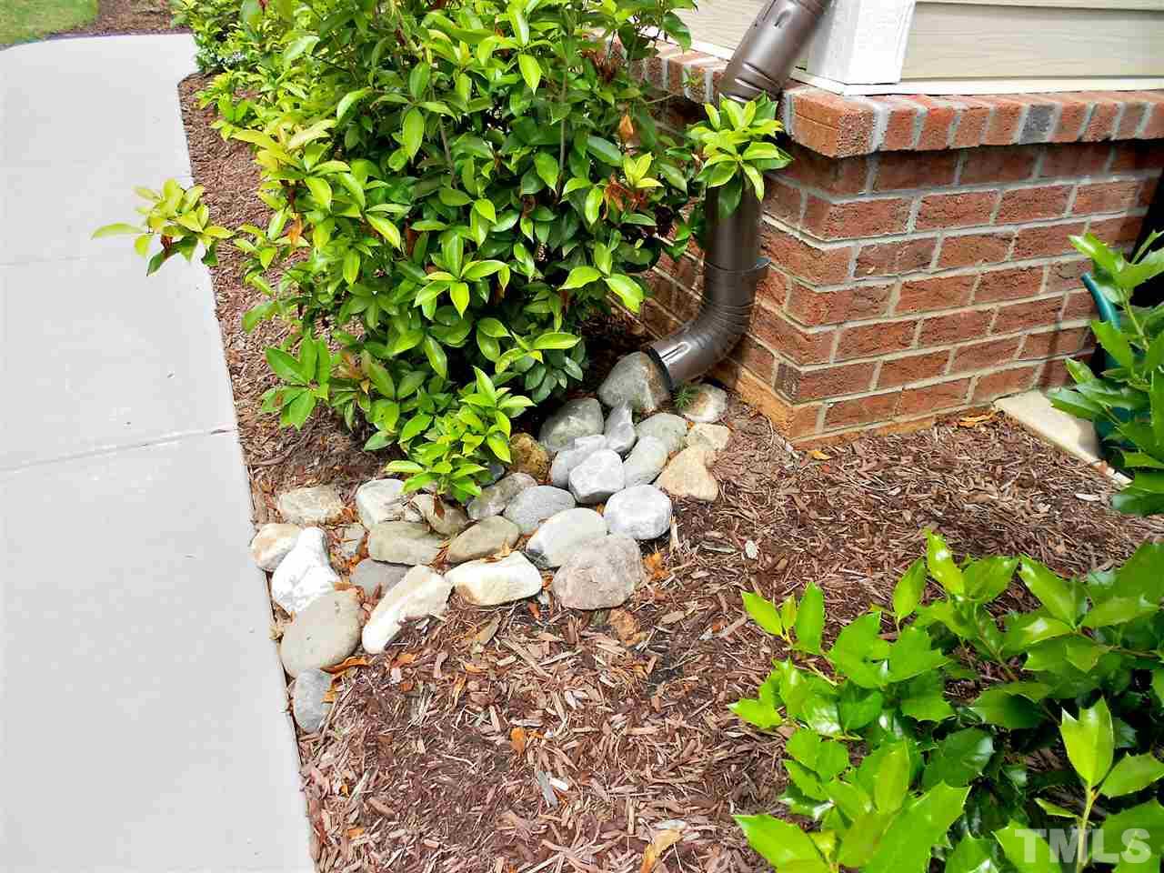 776 Fallon Grove Way Raleigh, NC 27608 - Photo 21 of 22 ...like the river rock splash trails help make The Grove at Fallon Park a special community.